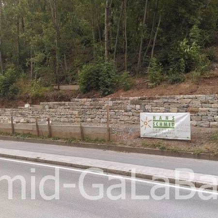 Trockenmauer beim Steinbruch Zimmermann mit Gebrauchten Sandstein durch die Gärtner der Hans Schmid GmbH